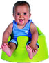 Baby in green bumbo baby seat.